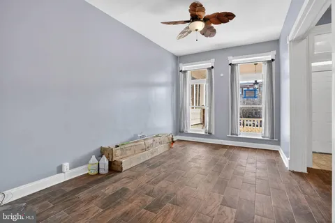 a view of an empty room with a window