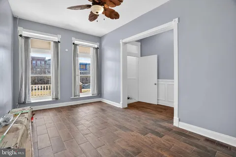 a view of an empty room with a window