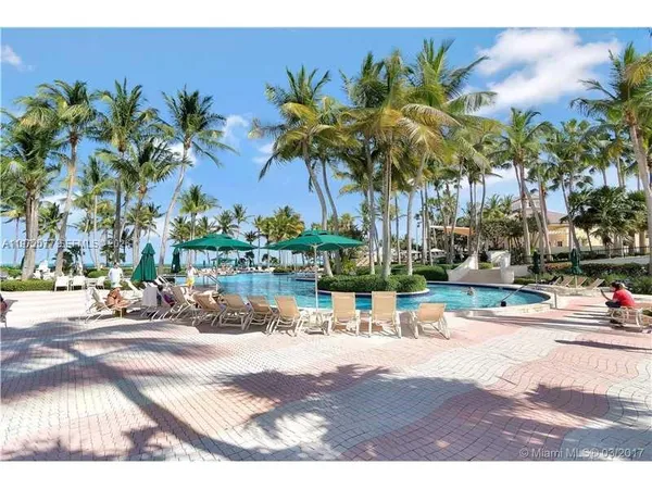 a view of a swimming pool with an outdoor space