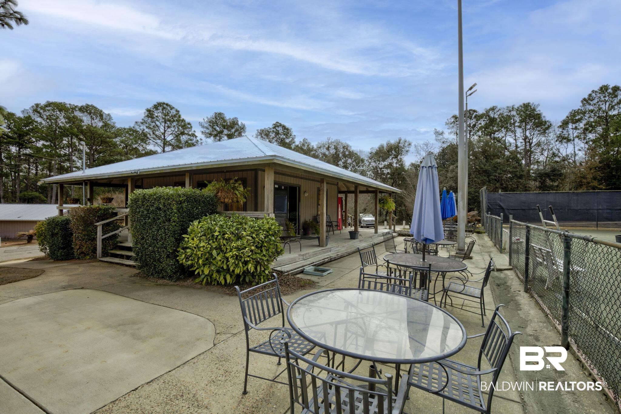 332 Ridgewood Drive Daphne, AL 36526 - Photo 46 of 48 View of patio featuring outdoor dining area