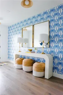 a spacious bedroom with a bed and a table