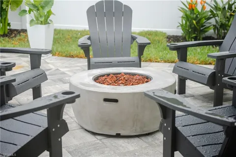 a view of a swimming pool with a patio