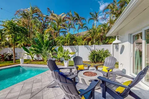 a outdoor space with lots of potted plants