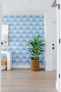 a bed room with a bed and a chandelier