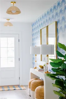 a kitchen with cabinets and window
