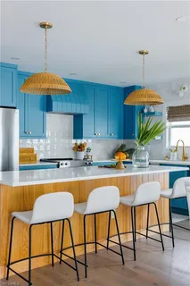 a bathroom with a sink and a window