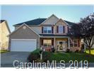 148 Roanoke Road Fletcher, NC 28732 - Photo 1 of 33 a house view with a garden space