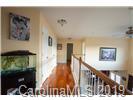 148 Roanoke Road Fletcher, NC 28732 - Photo 19 of 33 a view of a hallway