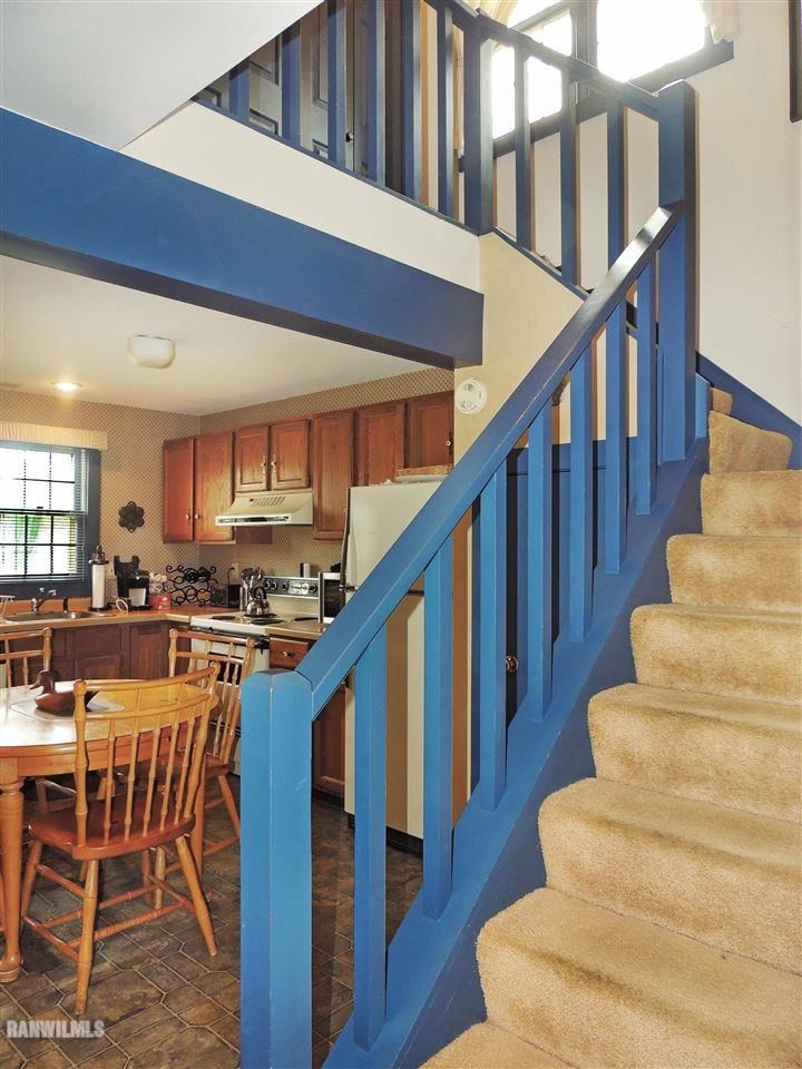 21 Thatcher Lane Galena, IL 61036 - Photo 14 of 25 a view of entryway and hall with wooden floor