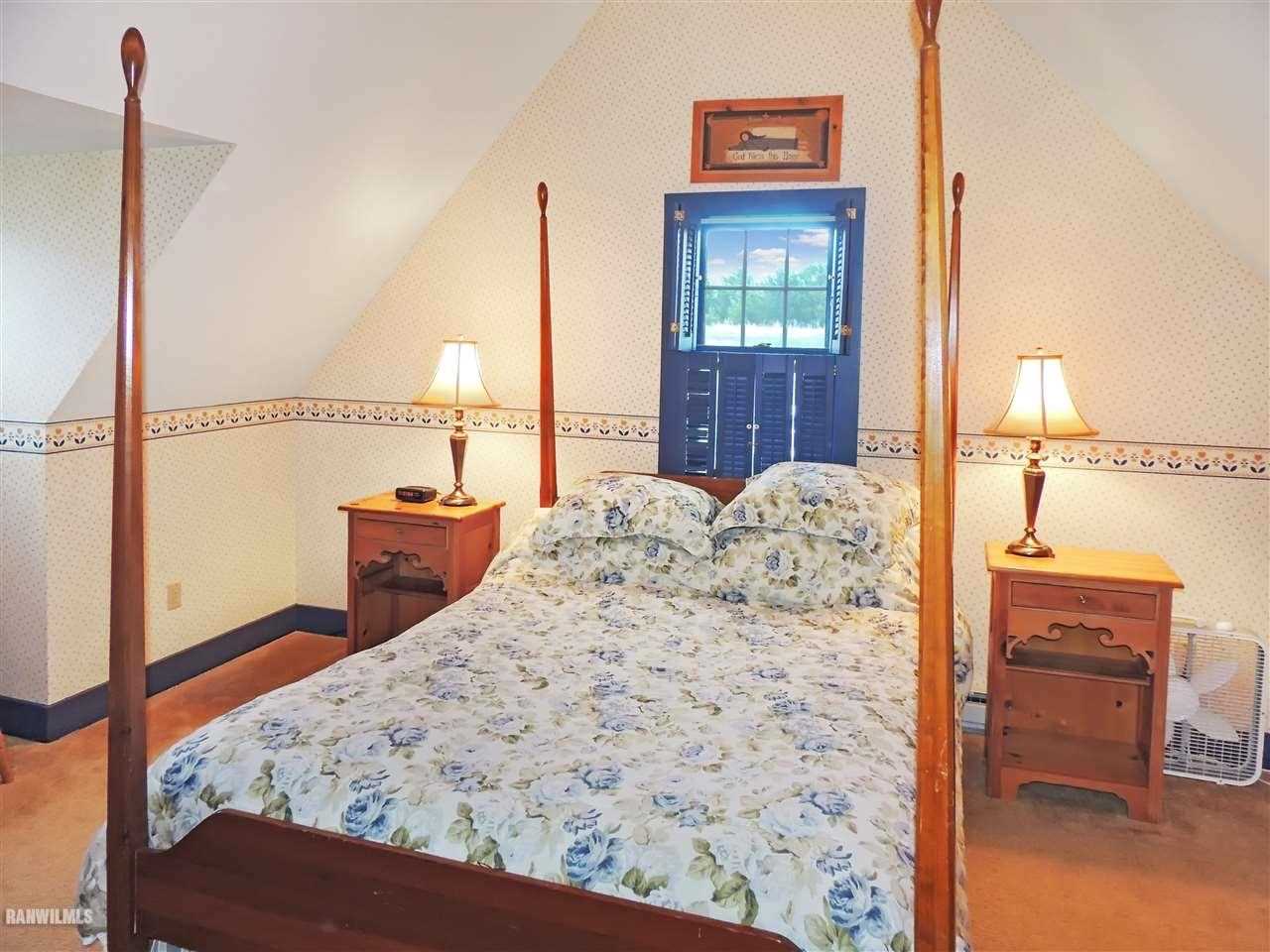 21 Thatcher Lane Galena, IL 61036 - Photo 17 of 25 a view of living room with furniture and window