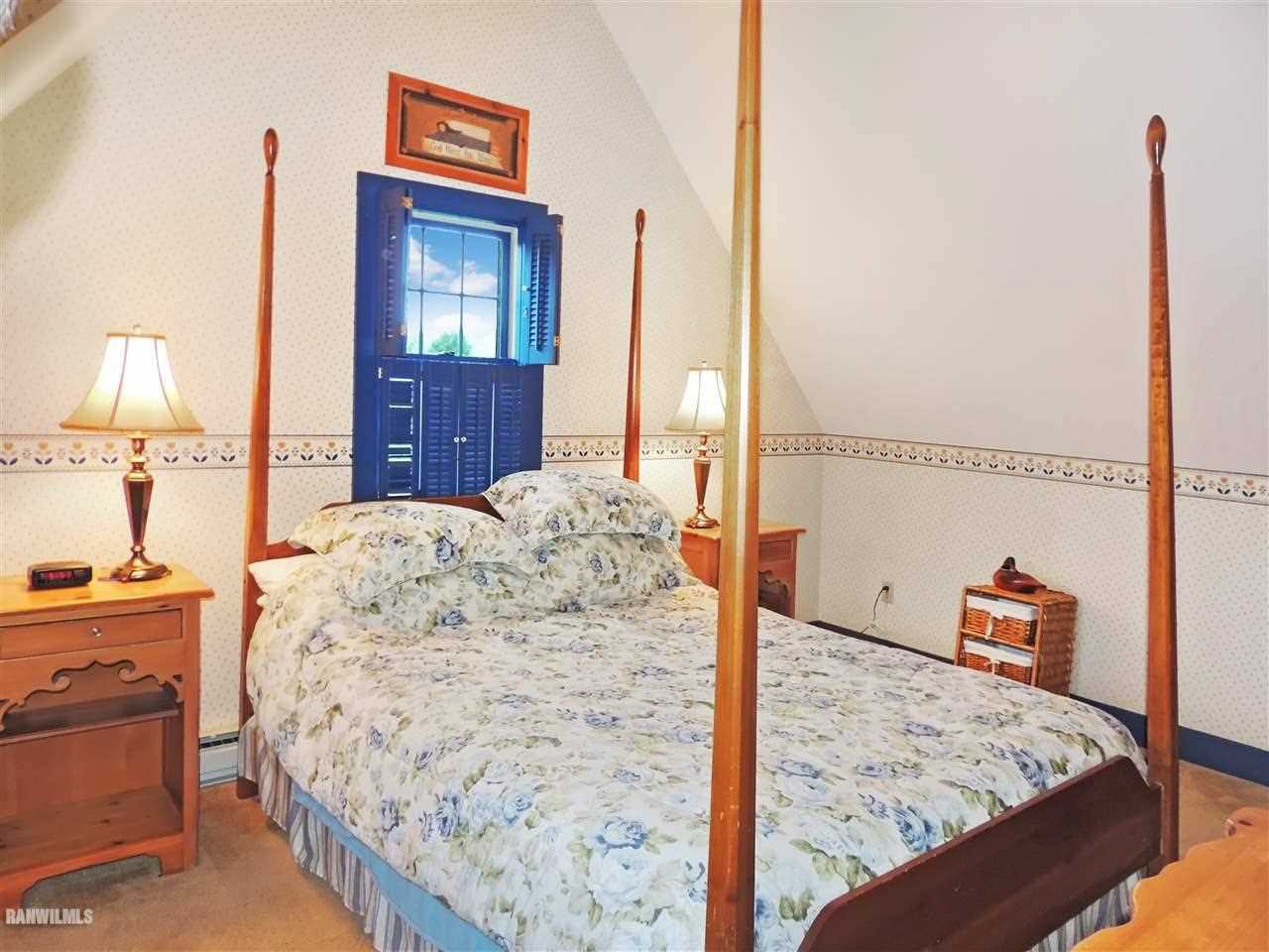 21 Thatcher Lane Galena, IL 61036 - Photo 19 of 25 a bed room with a bed