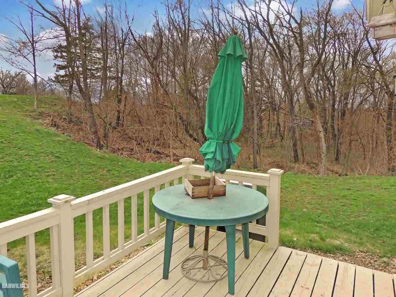 21 Thatcher Lane Galena, IL 61036 - Photo 25 of 25 a view of a chairs and table in the garden