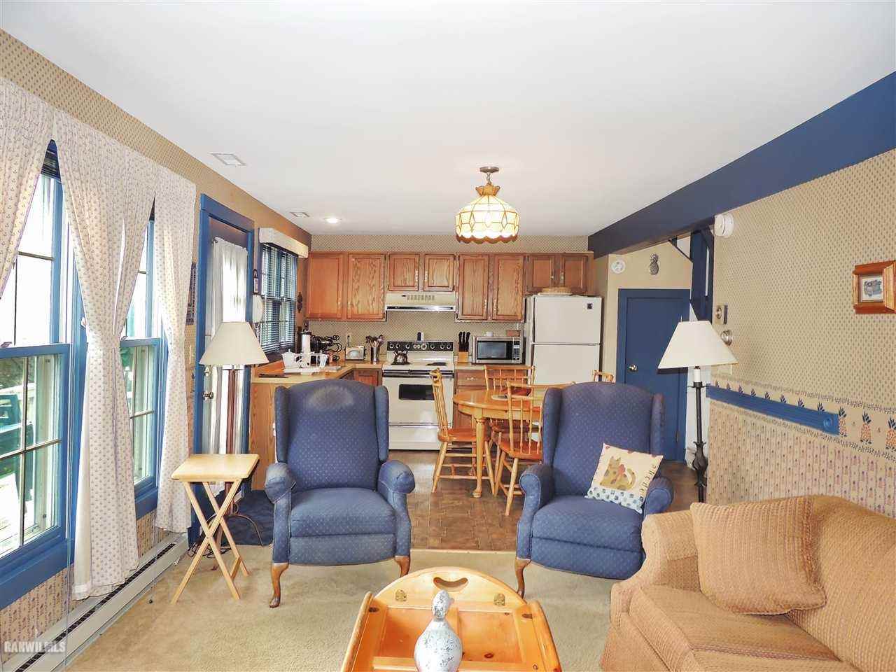 21 Thatcher Lane Galena, IL 61036 - Photo 10 of 25 a living room with furniture and a large window