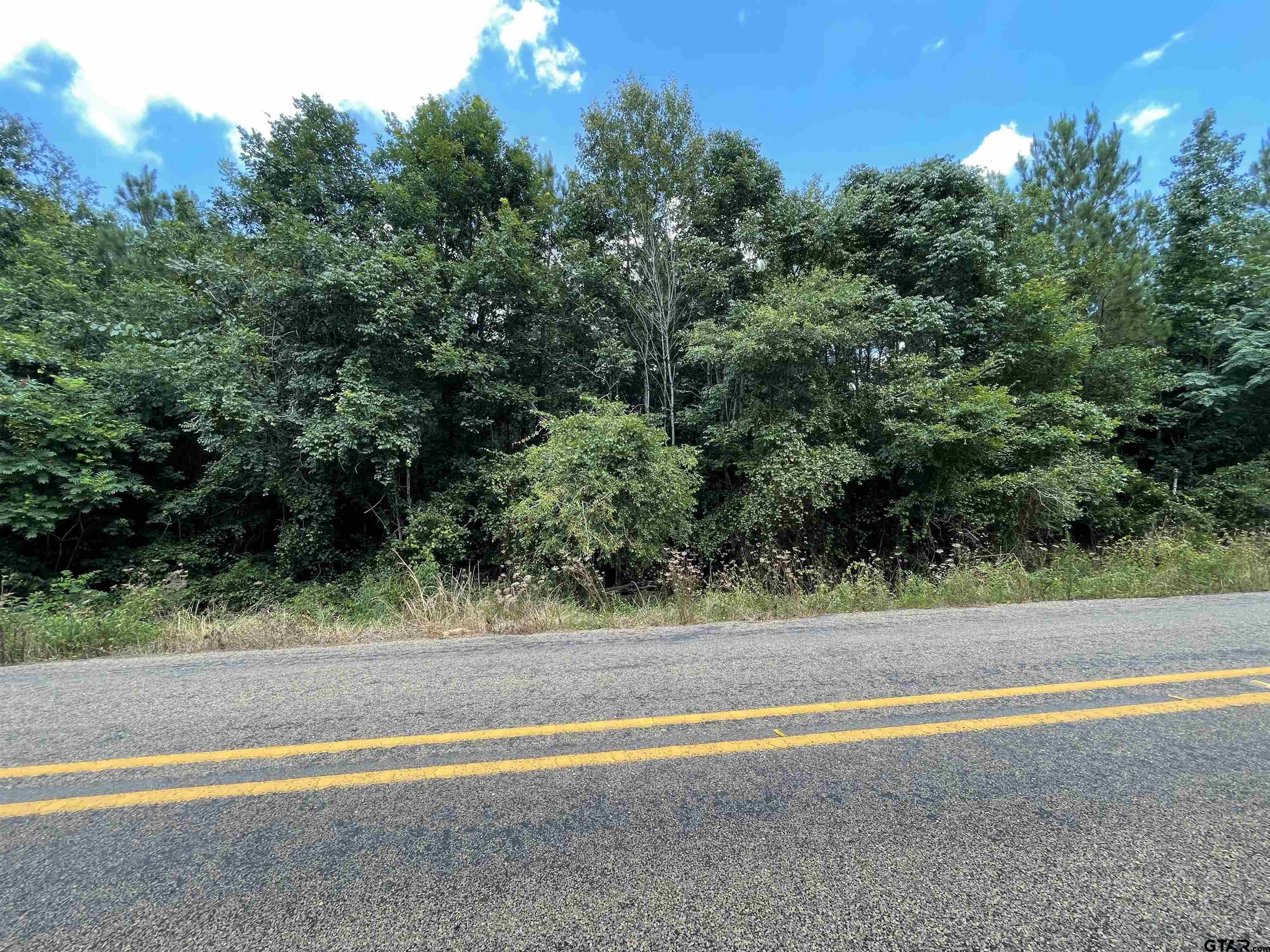 947 St Timpson Tx 75975 Timpson, TX 75975 - Photo 8 of 12 a view of a tennis court