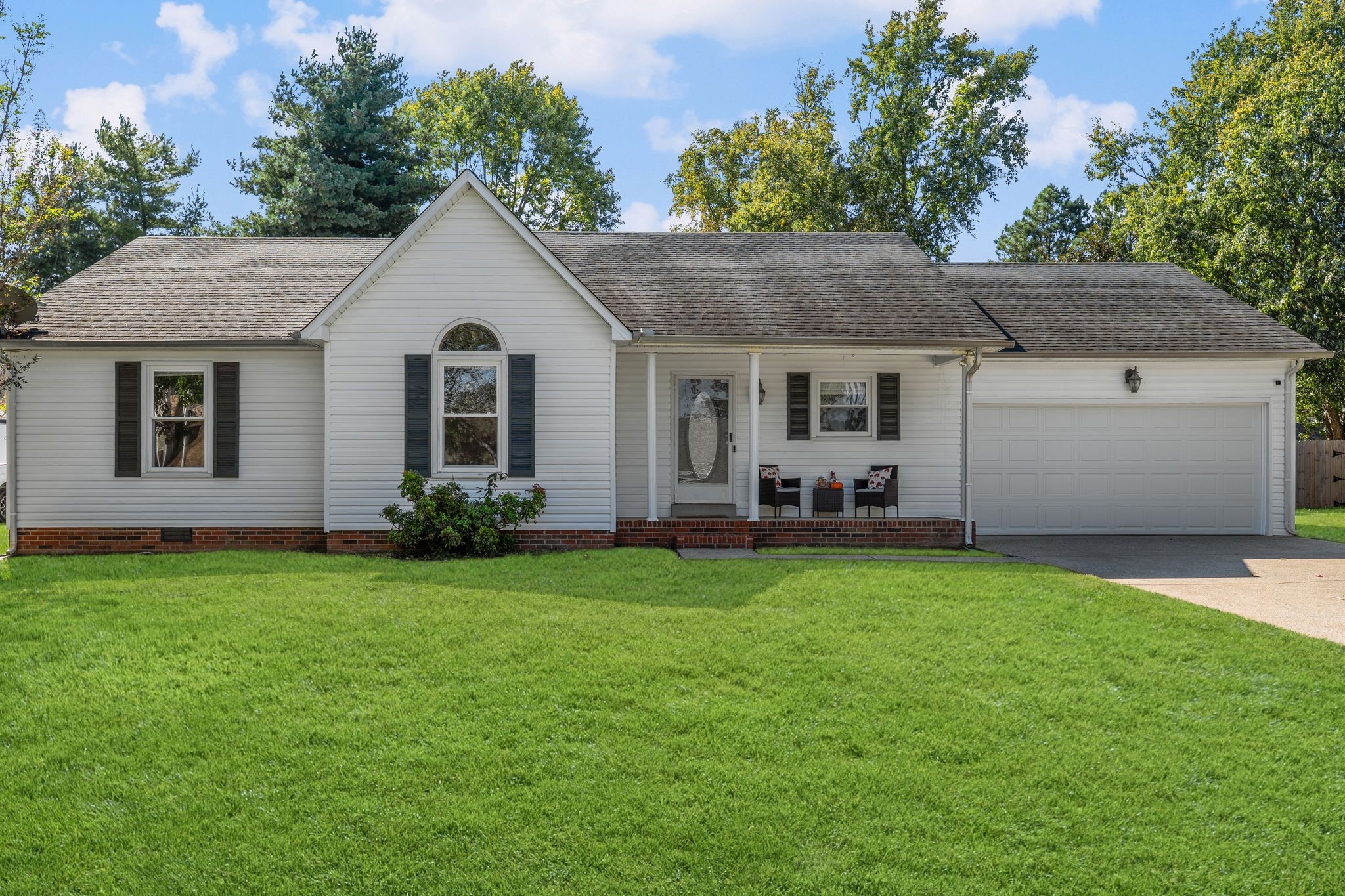 2511 Wellington Place Murfreesboro, TN 37128 - Photo 1 of 31 a front view of house with yard and trees in the background