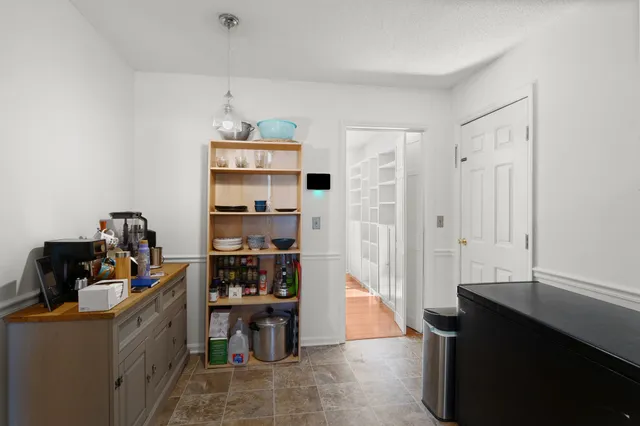 a room with furniture and window