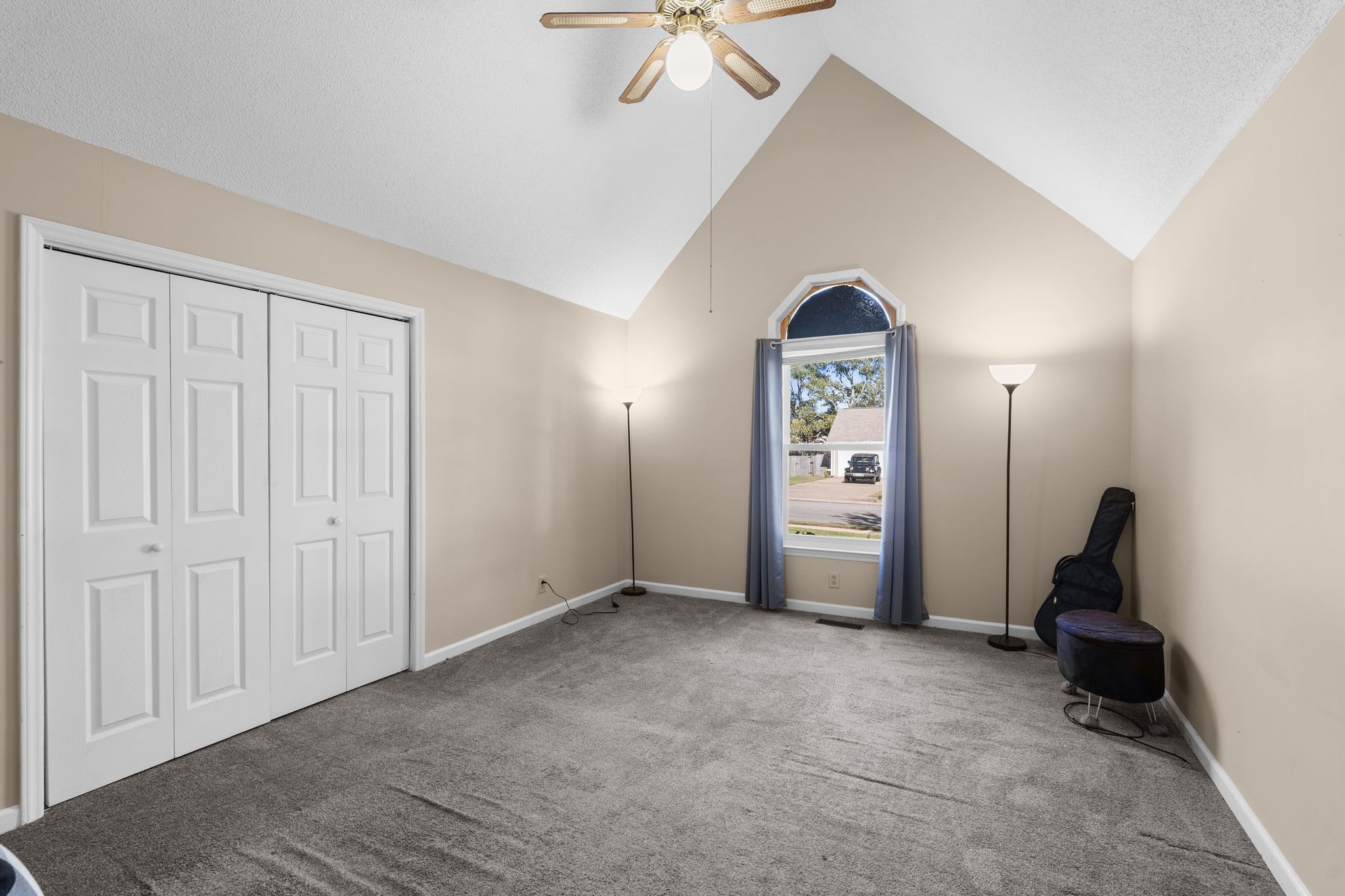 2511 Wellington Place Murfreesboro, TN 37128 - Photo 14 of 31 an empty room with a window and a ceiling fan
