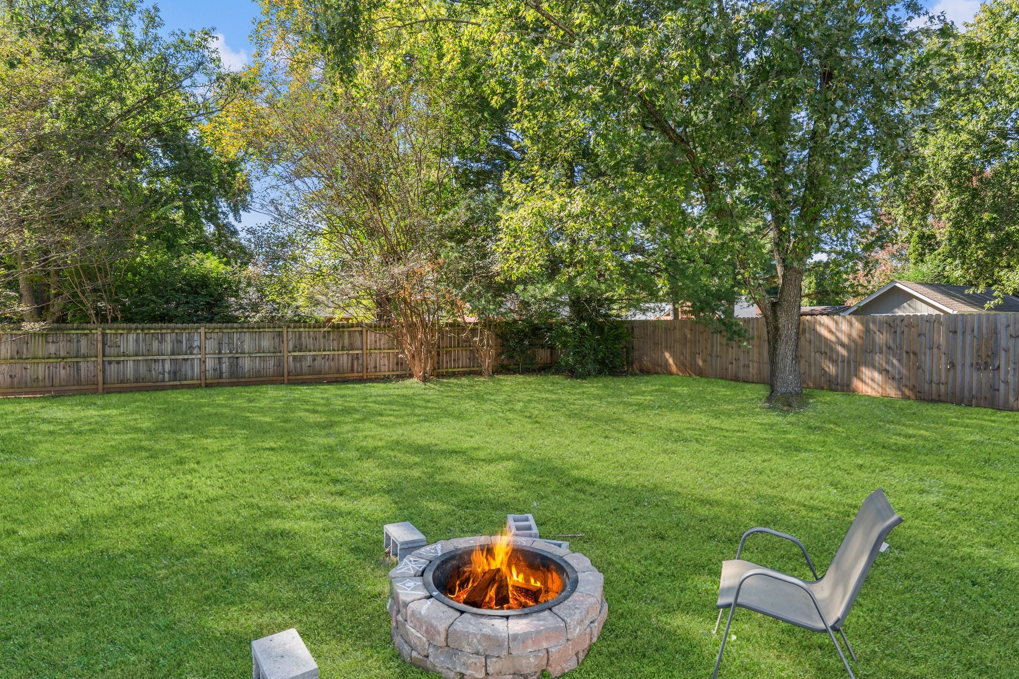 2511 Wellington Place Murfreesboro, TN 37128 - Photo 28 of 31 a backyard of a house with table and chairs