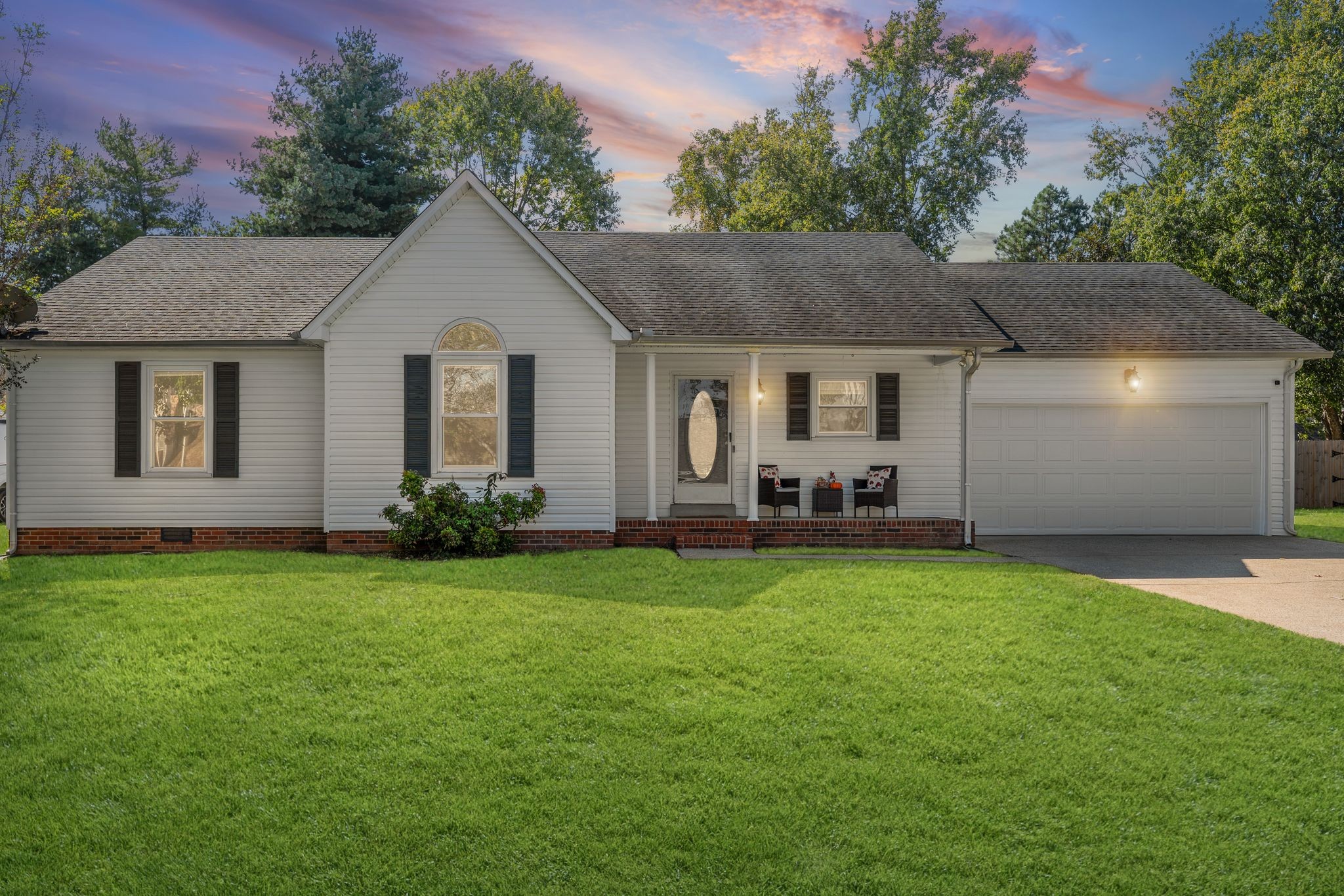 2511 Wellington Place Murfreesboro, TN 37128 - Photo 31 of 31 a front view of house with yard and trees in the background