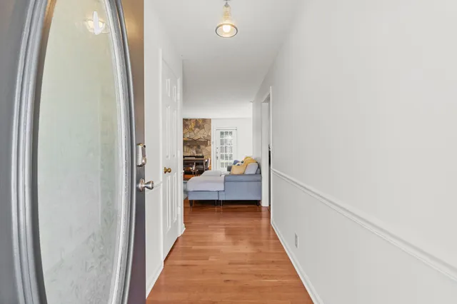 a view of a bedroom from a hallway