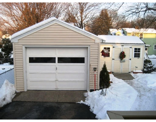 33 Sunapee Street Springfield, MA 01108 - Photo 16 of 17 a front view of a house with a garage