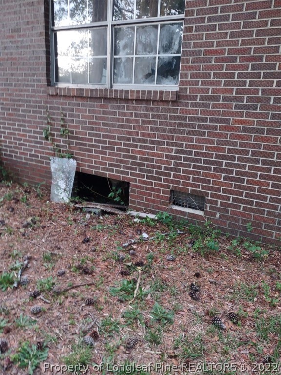 264 Freeman Mill Road Hamlet, NC 28345 - Photo 16 of 18 a view of a brick wall