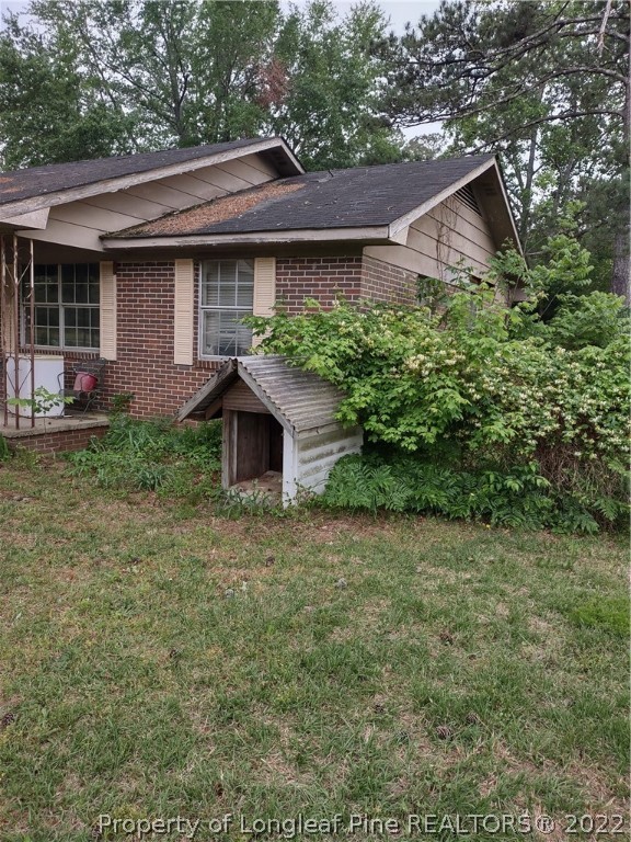 264 Freeman Mill Road Hamlet, NC 28345 - Photo 10 of 18 a view of a back yard of the house