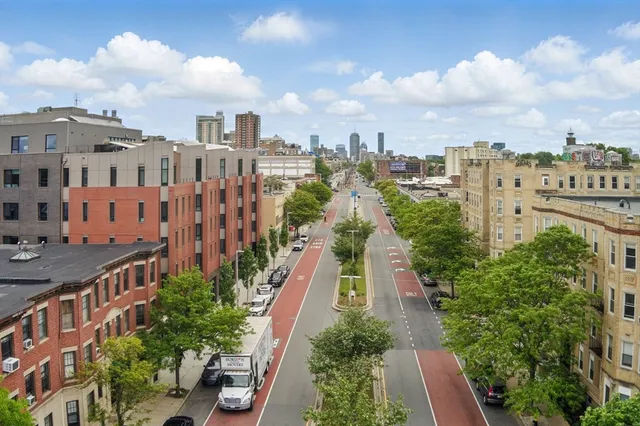 a view of a city with tall buildings