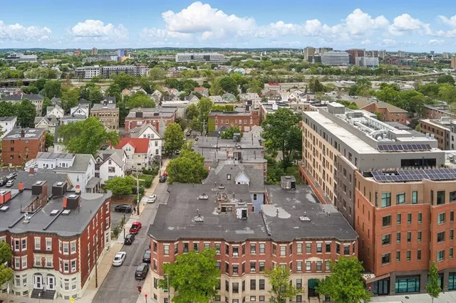 a view of city with tall buildings