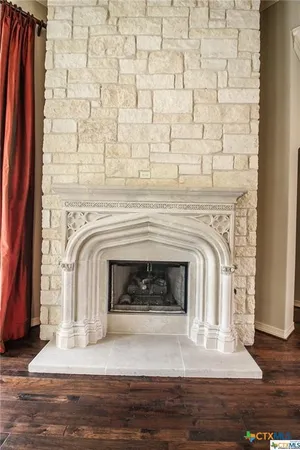 a living room with a fireplace