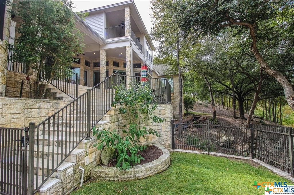 10286 Hartrick Bluff Road Temple, TX 76502 - Photo 4 of 46 a view of a house with a small yard and plants