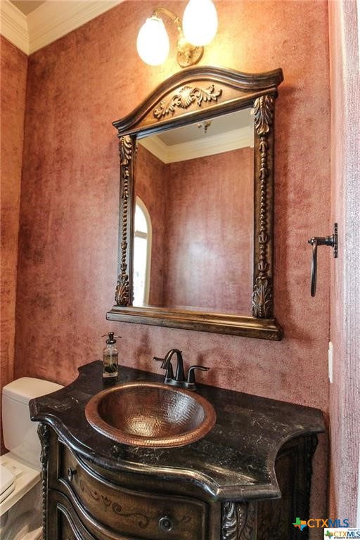 10286 Hartrick Bluff Road Temple, TX 76502 - Photo 41 of 46 a bathroom with a sink and a mirror