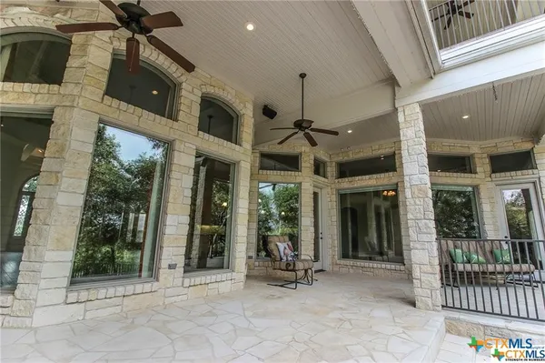 a view of a building with sitting area
