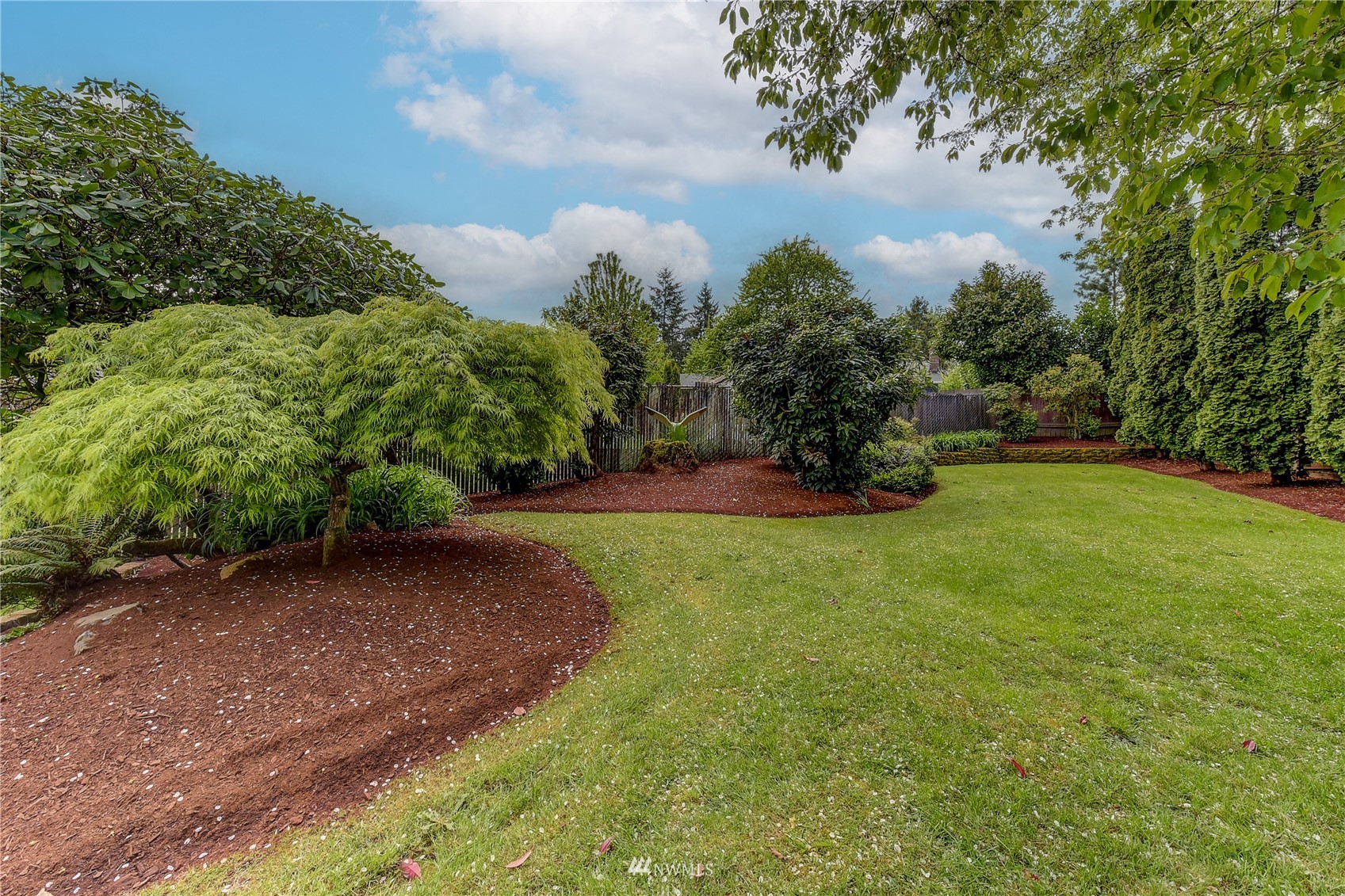 22028 5th Avenue West Bothell, WA 98021 - Photo 17 of 19 a view of a field with sitting area