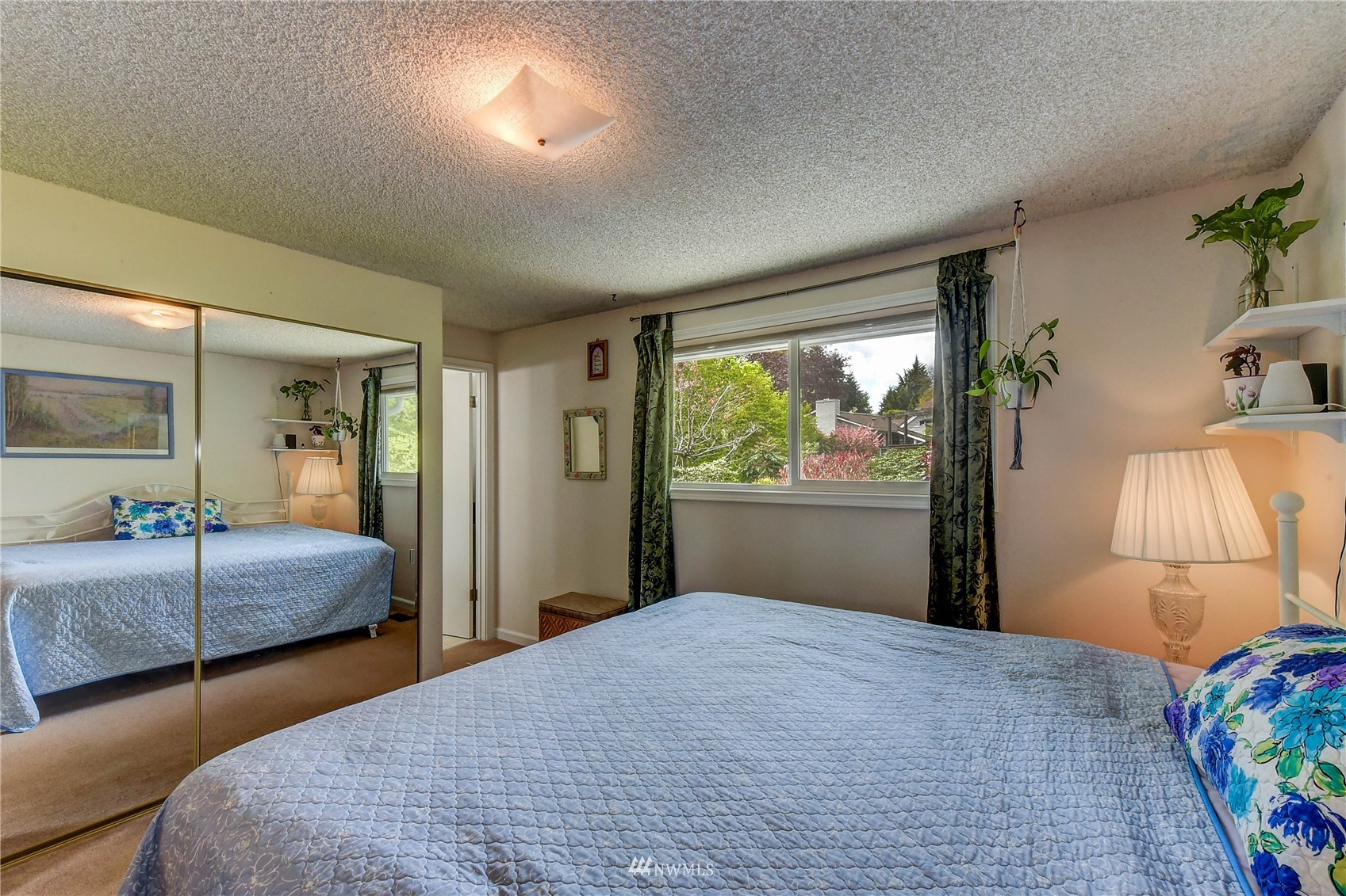 22028 5th Avenue West Bothell, WA 98021 - Photo 7 of 19 a bedroom with two beds and a window