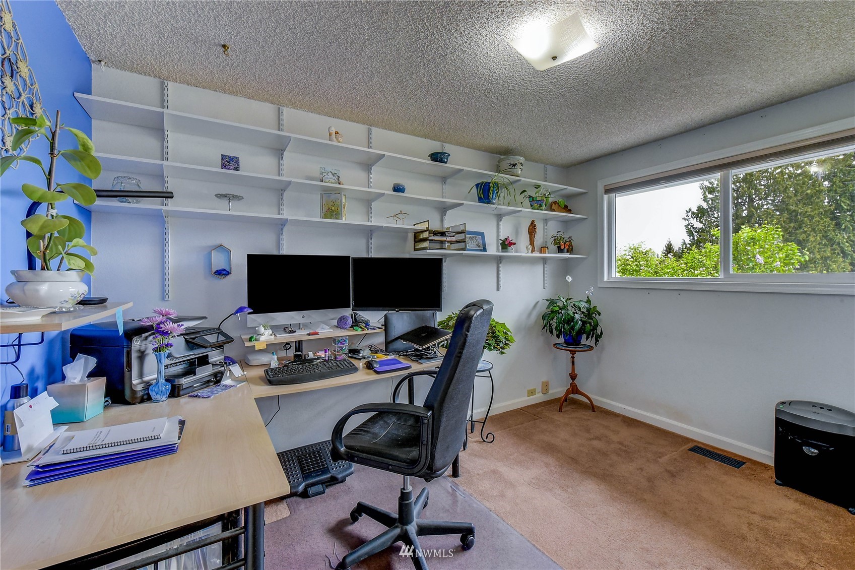 22028 5th Avenue West Bothell, WA 98021 - Photo 9 of 19 a workspace with furniture and a window
