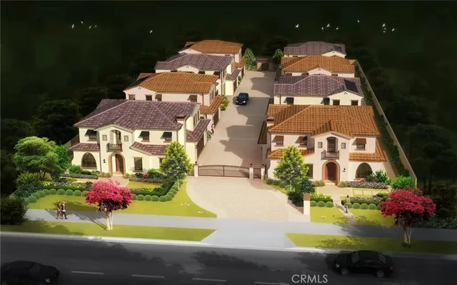 an aerial view of a house with yard