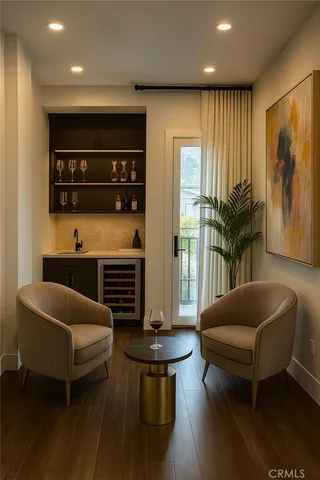 a living room with furniture a ceiling fan and a rug