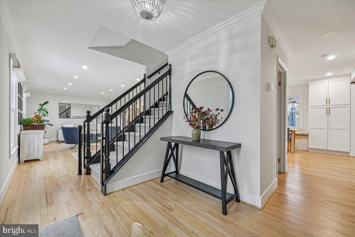 4 Olmstead Court Potomac, MD 20854 - Photo 2 of 48 a view of an entryway with wooden floor and windows
