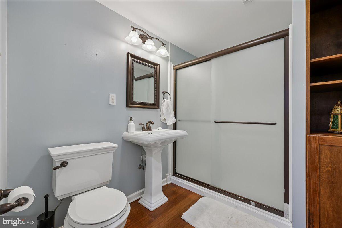 4 Olmstead Court Potomac, MD 20854 - Photo 41 of 48 a bathroom with a sink toilet and shower
