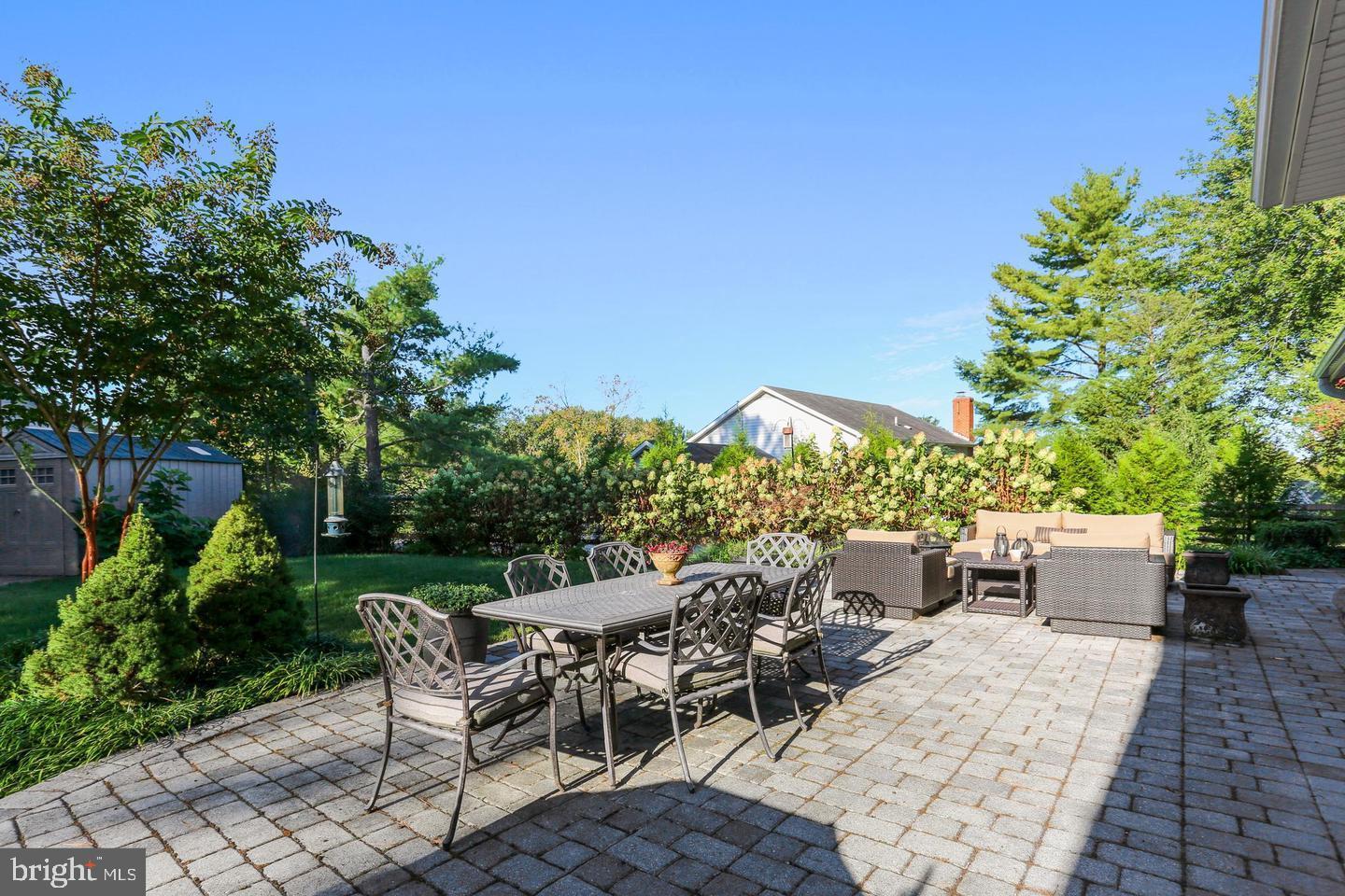 4 Olmstead Court Potomac, MD 20854 - Photo 45 of 48 a view of backyard with seating area and green space