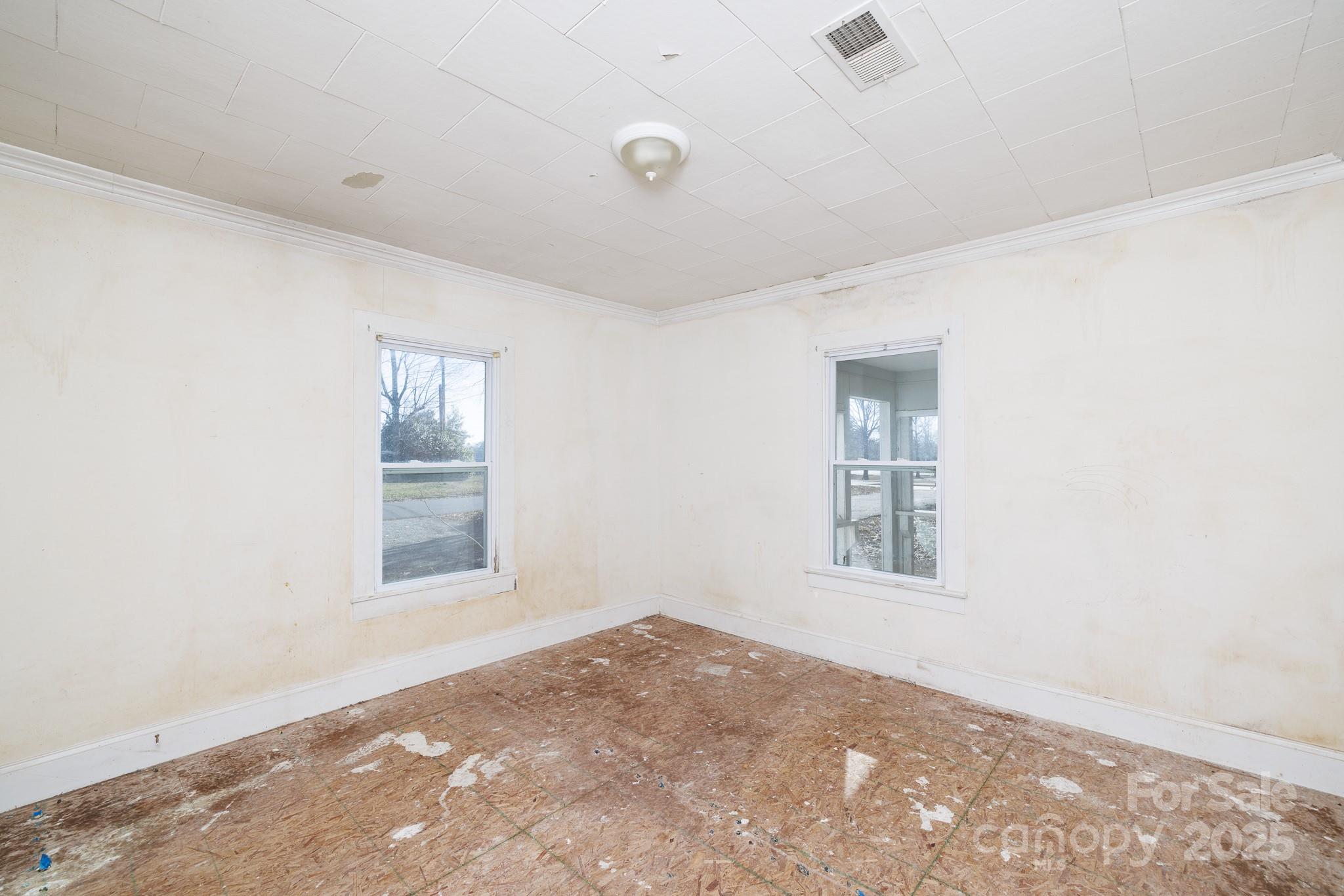 609 Bethel Street Clover, SC 29710 - Photo 13 of 19 a view of empty room with windows