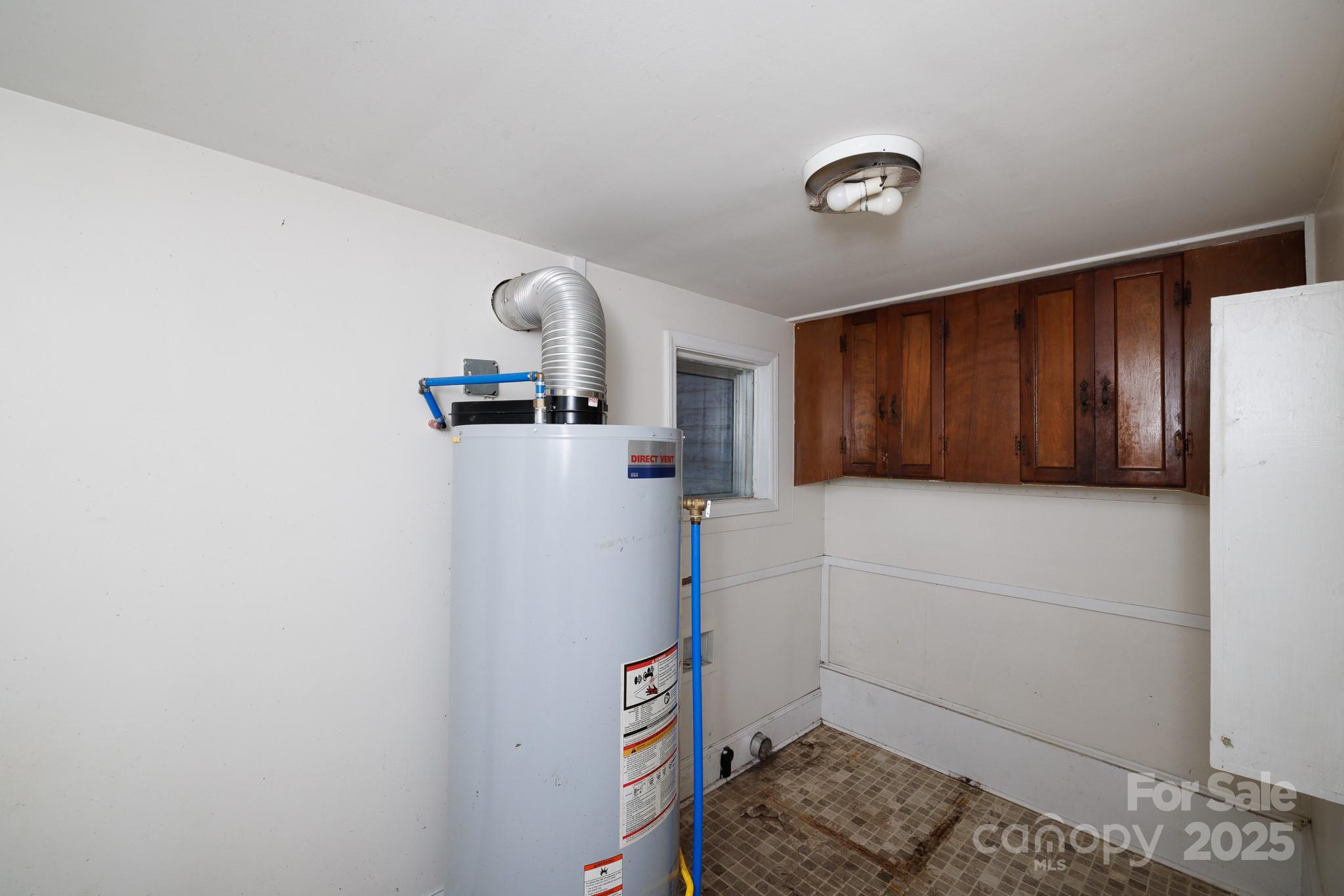 609 Bethel Street Clover, SC 29710 - Photo 17 of 19 a kitchen with a refrigerator and cabinets