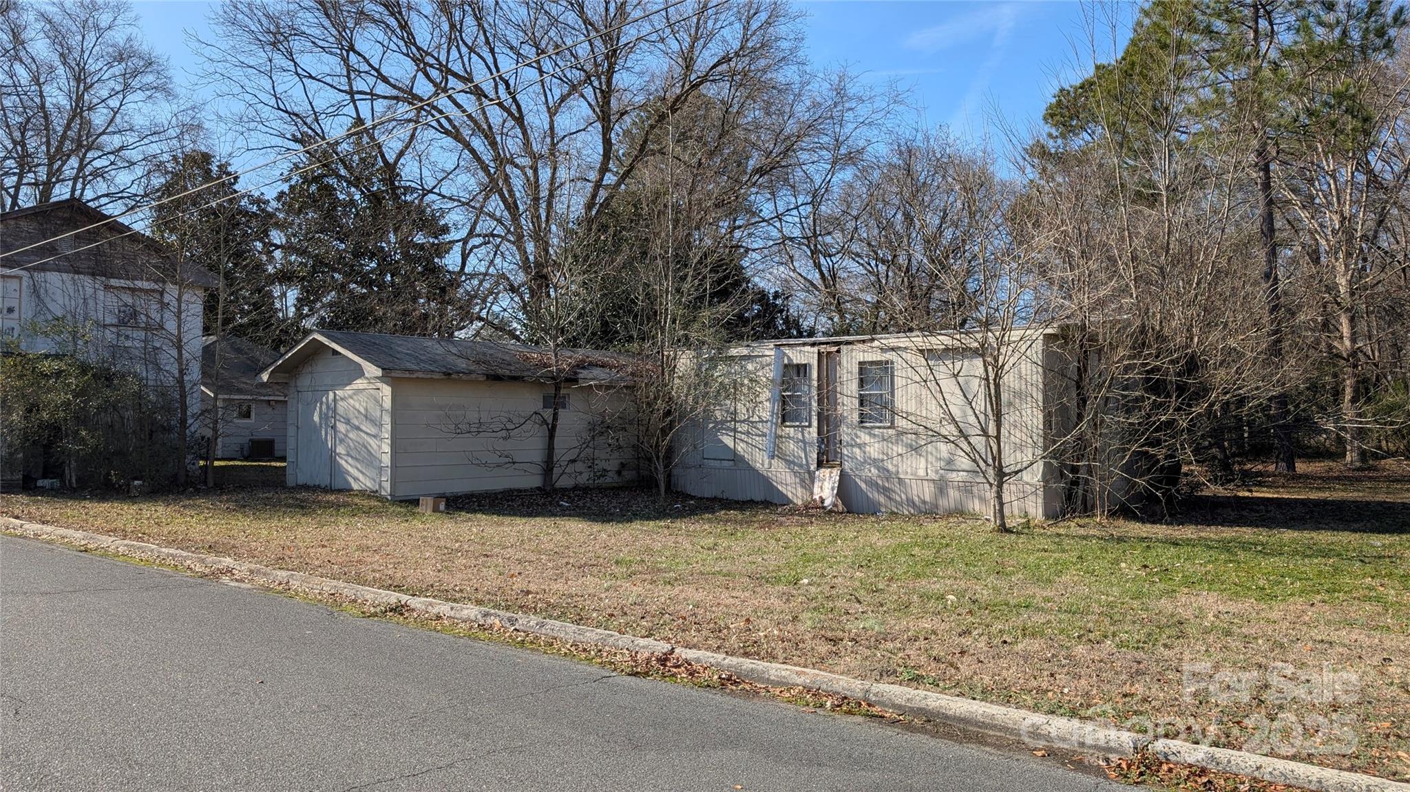 609 Bethel Street Clover, SC 29710 - Photo 5 of 19 a view of a barn with large trees