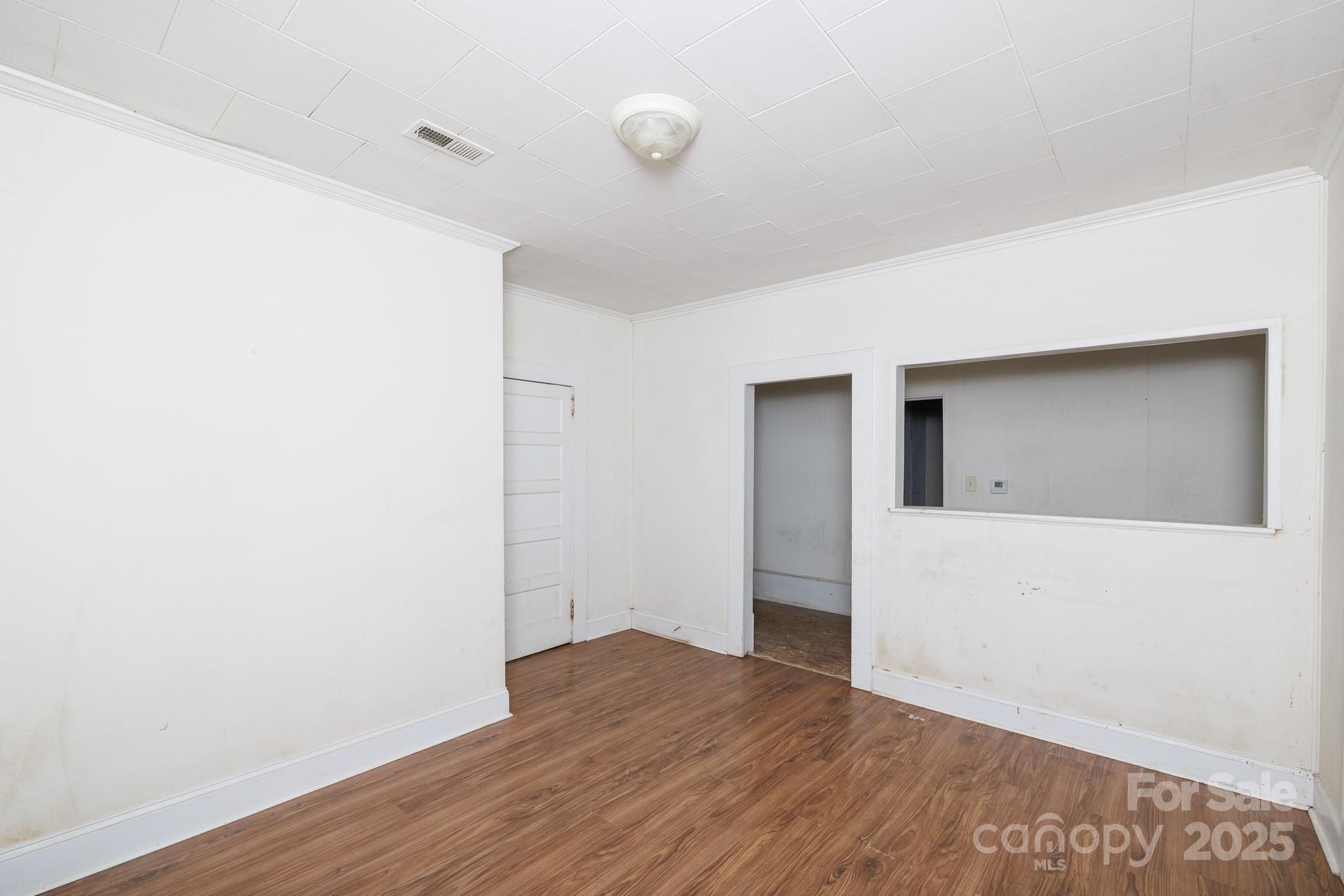 609 Bethel Street Clover, SC 29710 - Photo 10 of 19 a view of empty room with wooden floor