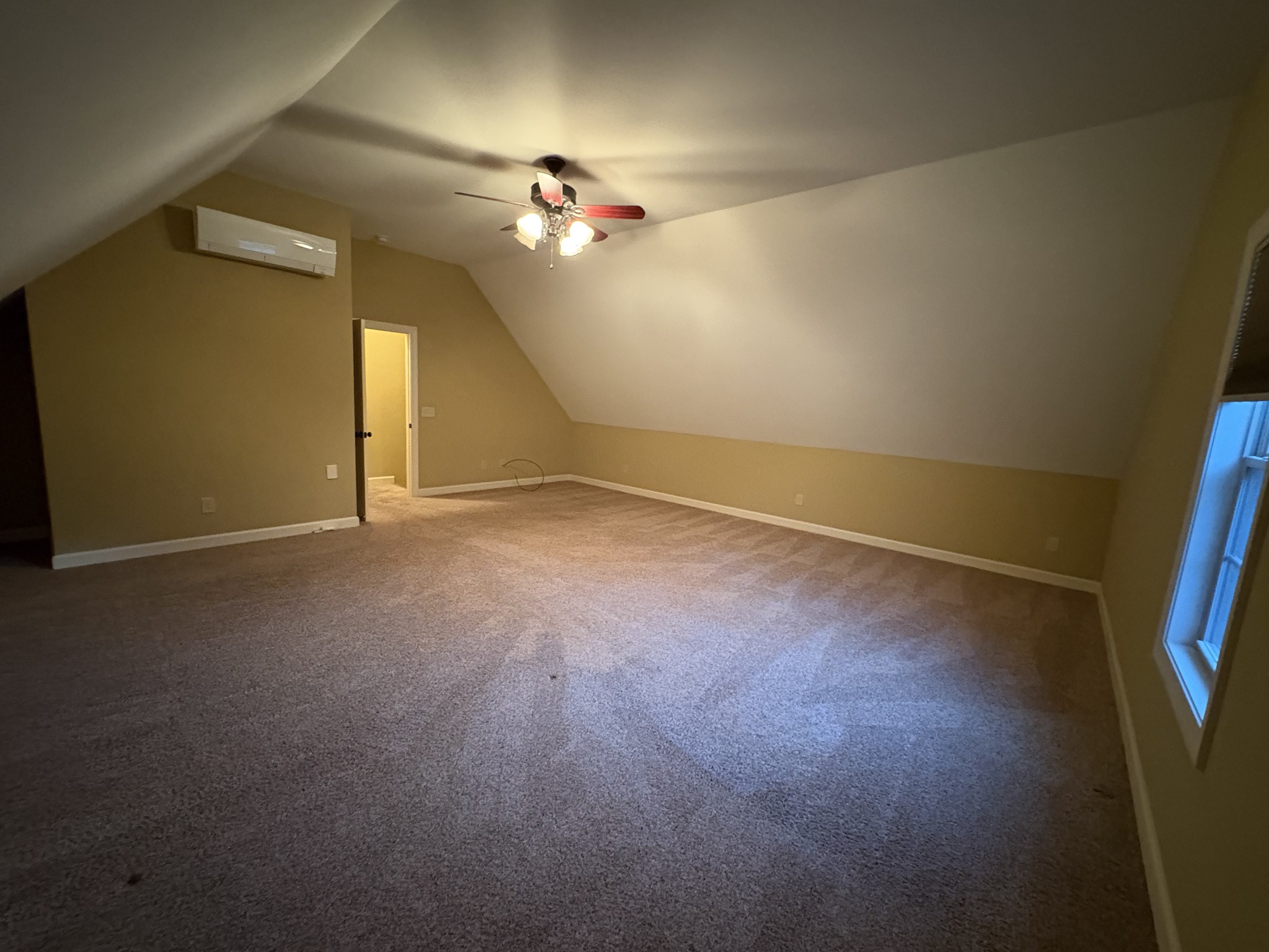 117 Grayson Lane White House, TN 37188 - Photo 13 of 24 an empty room with a empty space and a ceiling fan