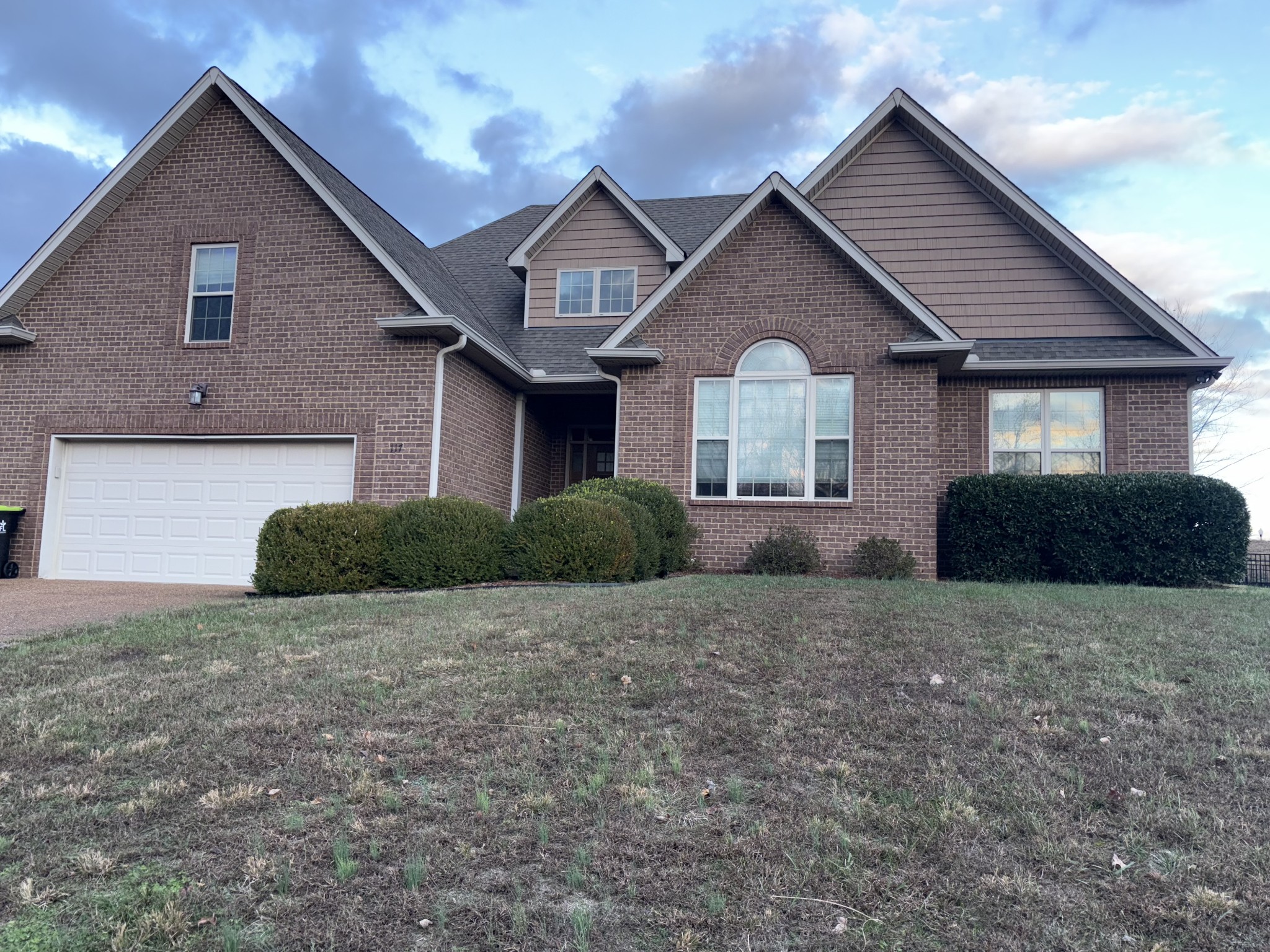 117 Grayson Lane White House, TN 37188 - Photo 24 of 24 a front view of a house with a yard and garage