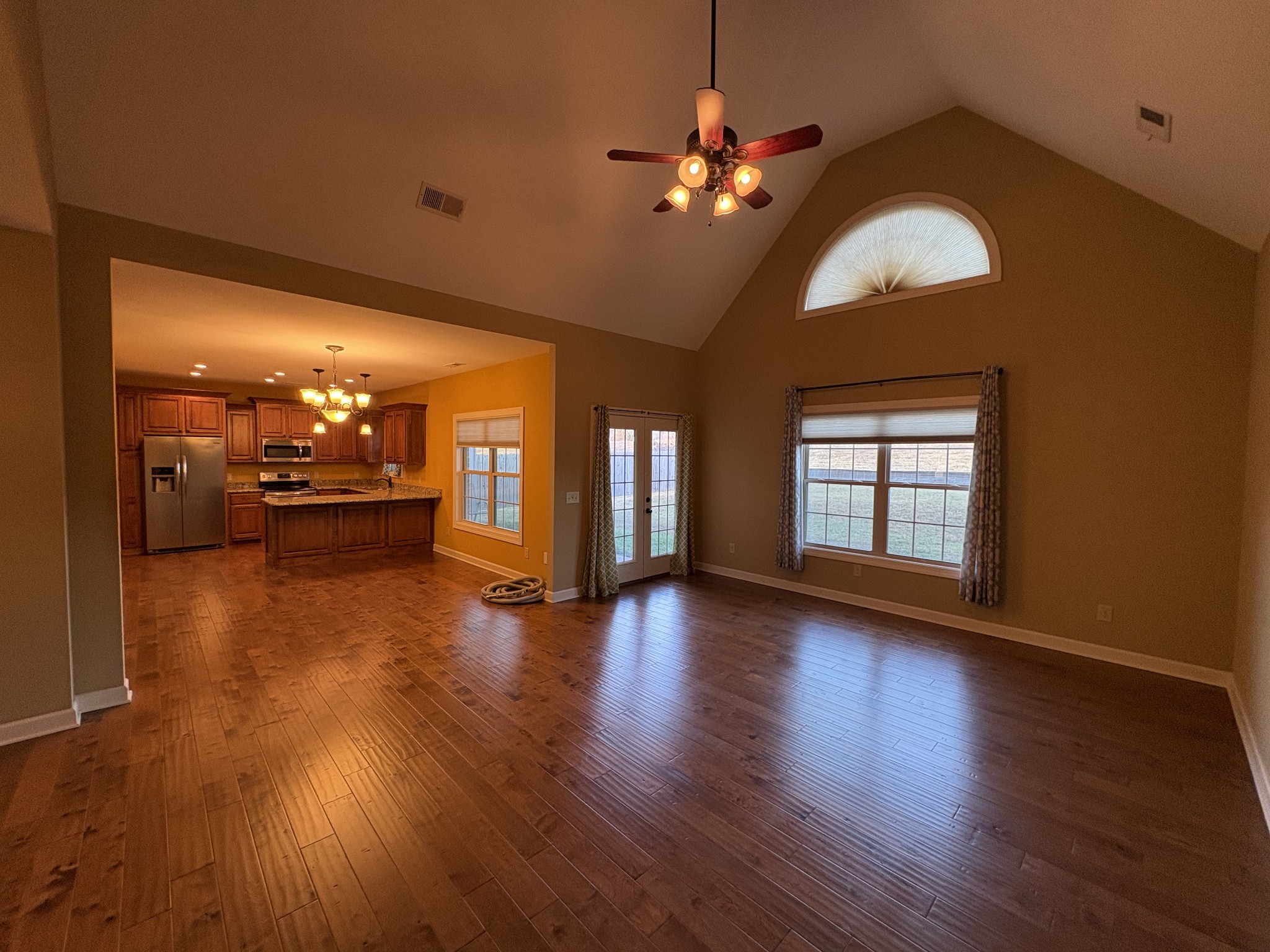 117 Grayson Lane White House, TN 37188 - Photo 4 of 24 wooden floor in an empty room with a window