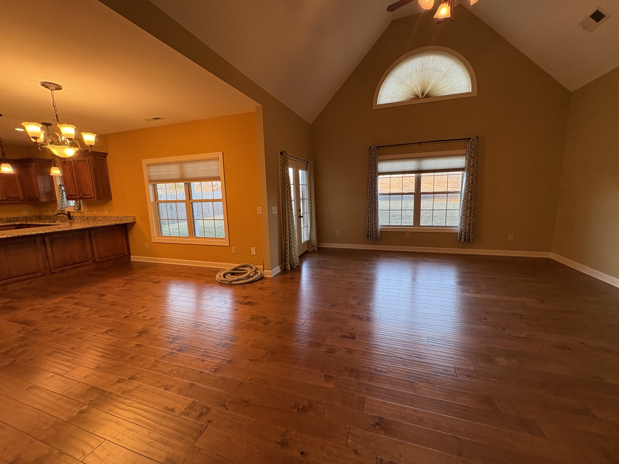 117 Grayson Lane White House, TN 37188 - Photo 5 of 24 an empty room with wooden floor and windows