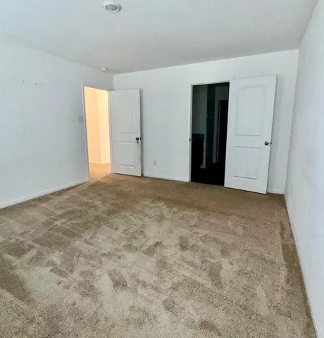 an empty room with a natural light